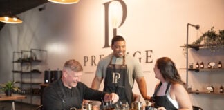 Grant Berry, and Indianapolis firefighter, celebrated the grand opening of Prestige Candle Co. on Aug. 22. (Photo provided/Grant Berry)