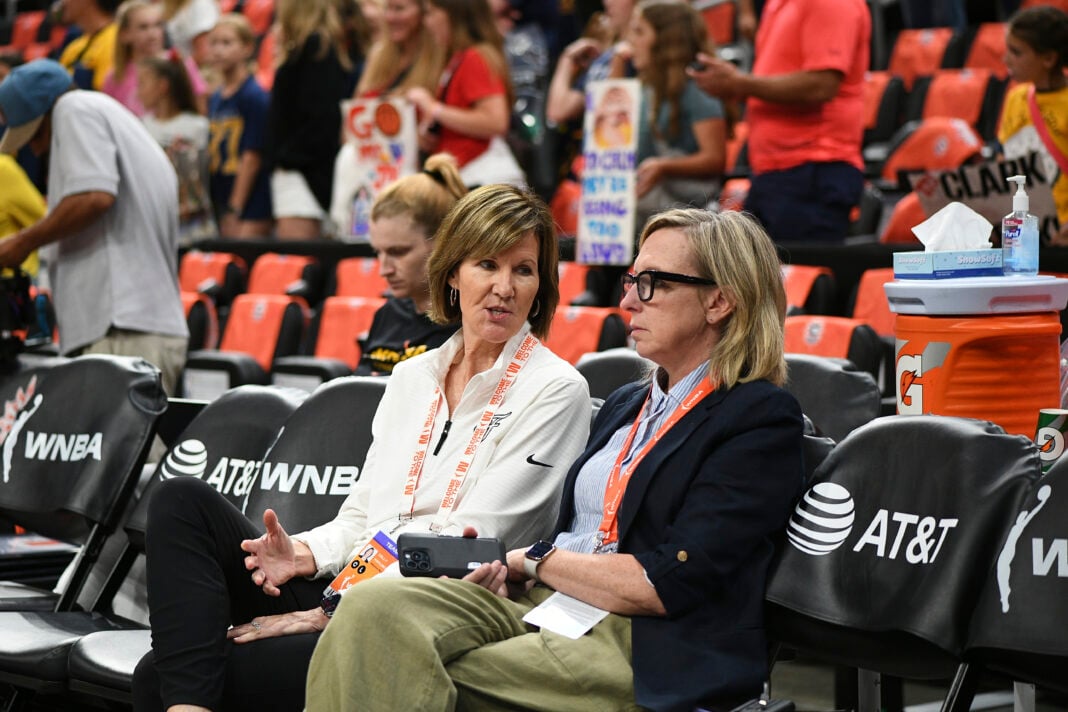 BOSTON, MA - JULY 15: Indiana Fever President of Basketball and Business Operations Kelly Krauskopf (left) and Indiana Fever Chief Operating Officer and General Manager Amber Cox (right) interact before a WNBA game between the Indiana Fever and the Connecticut Sun on July 15, 2025, at TD Garden in Boston, MA. (Photo by Erica Denhoff/Icon Sportswire) (Icon Sportswire via AP Images)