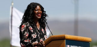 FILE - Benita Fitzgerald Mosley, a U.S. Olympic gold medalist, speaks during a ceremonial groundbreaking for a new Olympic museum, June 9, 2017, in Colorado Springs, Colo. (AP Photo/David Zalubowski, File)