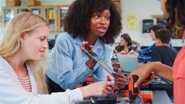 Educator teaching with technology (Getty Images)