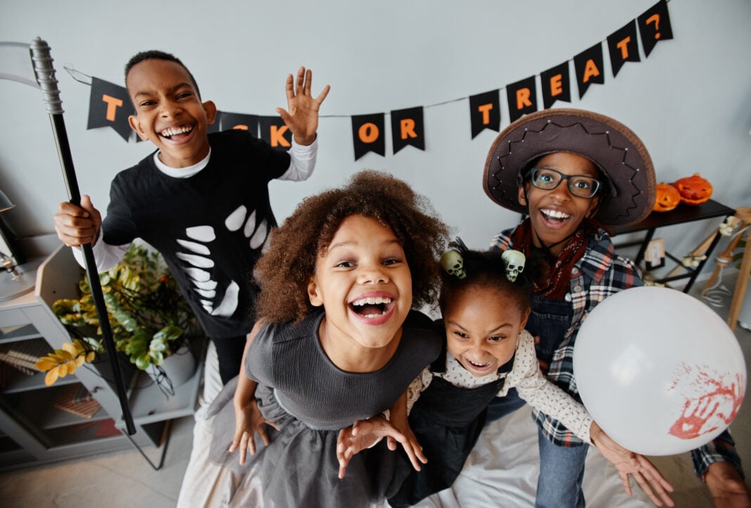 Portrait of Kids on Halloween Indoors